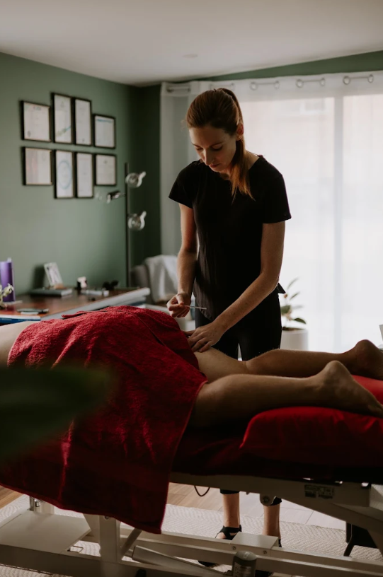 Laura performing massage treatment